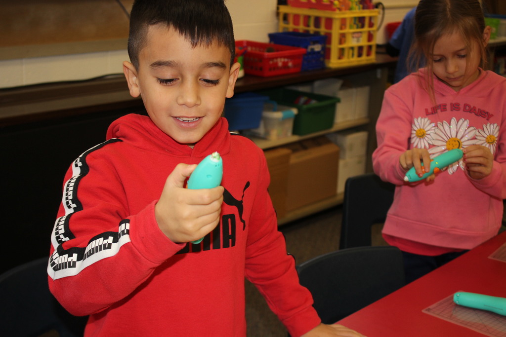 A Broadway student works with a 3D Pen.  