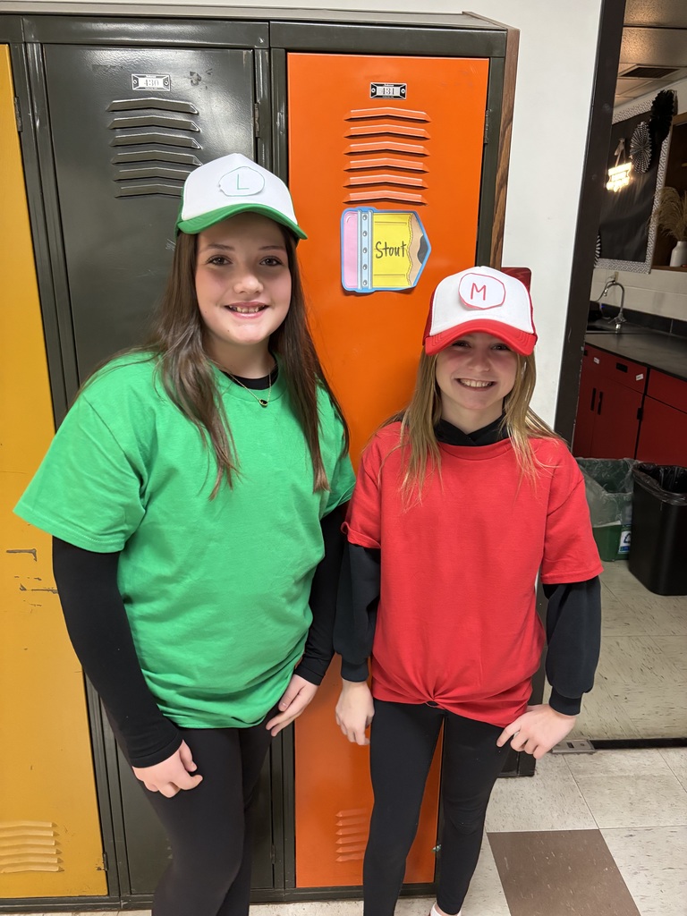 Two girls for Twin Day at L.T. Ball dressed alike.