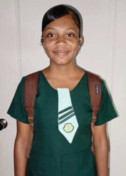 The photo shows a teenager in Belize who will benefit from the fundraising efforts and compassion by five TMS students. 
