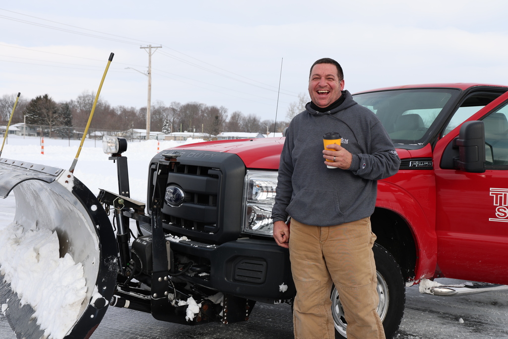 Our maintenance team takes a coffee break.  Two days of hard work to clear our parking lots. 