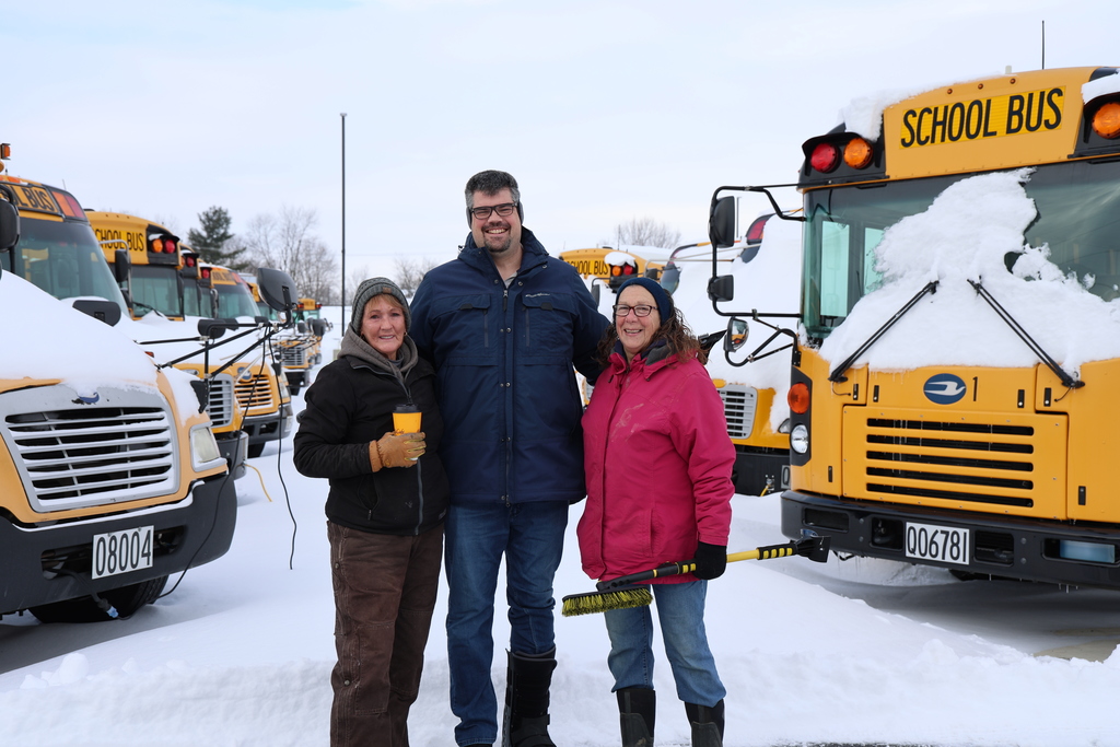 Our bus drivers gets ready to help clear snow.  