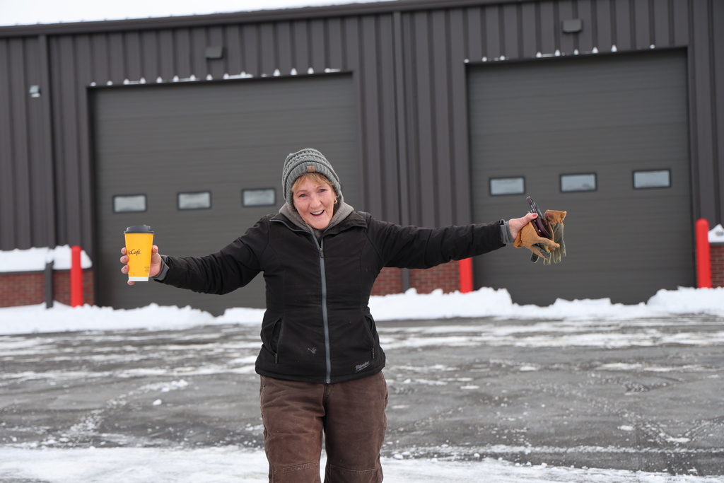 One of our bus drivers gets ready to help clear snow.  