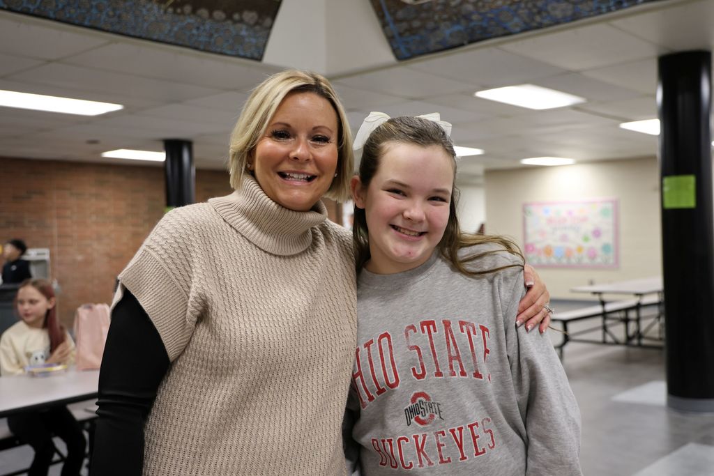 LT Ball students are happy to be in school with their friends and principal.  