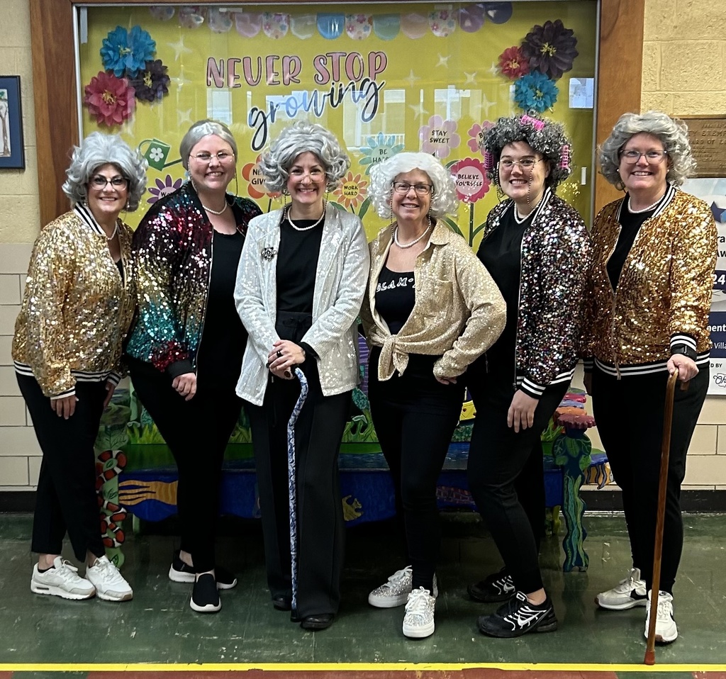 Kindergarten teachers dressed up for 100 days. 