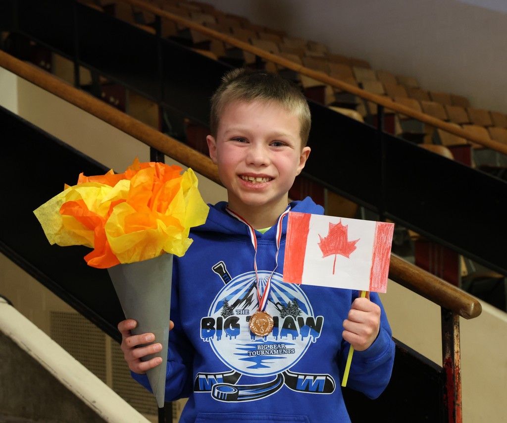 Kaiden Willis was the torch bearer for the 2nd grade Olympics.
