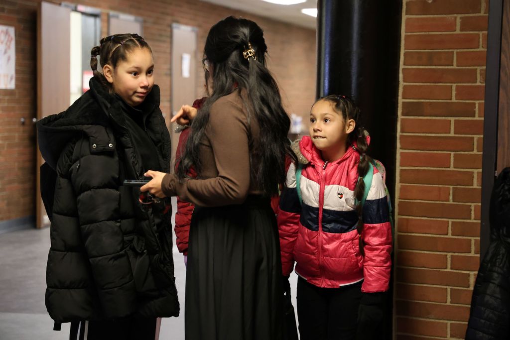 Maria Lozoya with students at the start of their day.