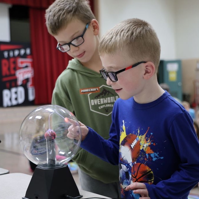 Broadway Elementary students "interact" with thunder and lightning presented by COSI.
