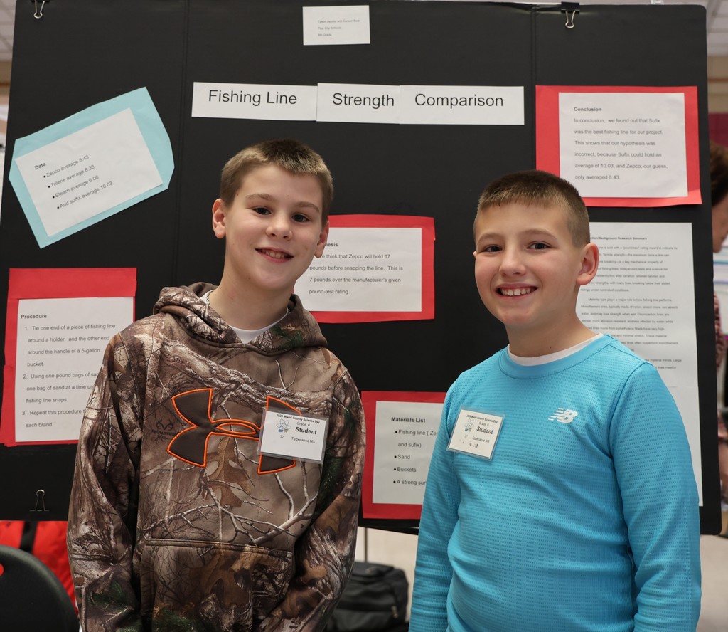 Tippecanoe Middle School student poses with her project at Miami County Science Day.