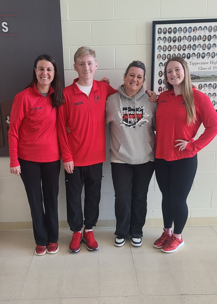 Tippecanoe High School swimmers with their mom and coach before they head to state competition.