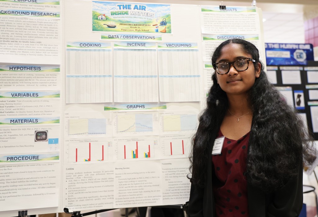 THS student with her project at Miami County Science Day.