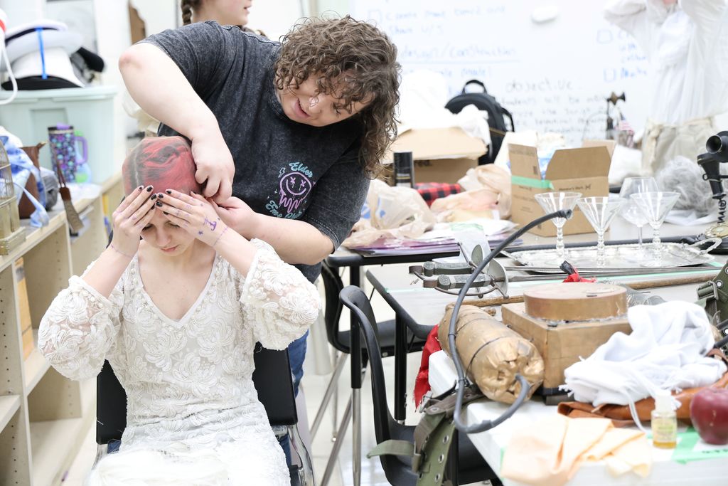 Getting ready for makeup behind the scenes.