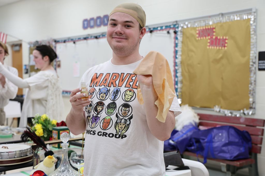 Getting ready for makeup behind the scenes.