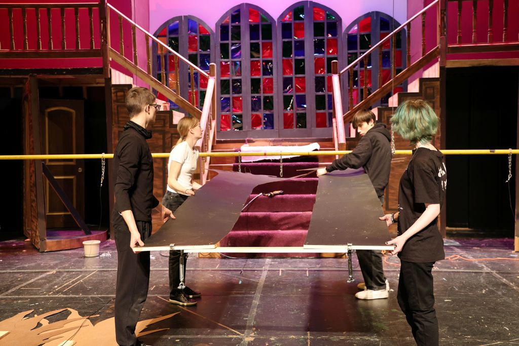 Constructing a scene for the production.