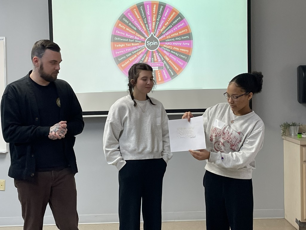 Students present project on a field trip.