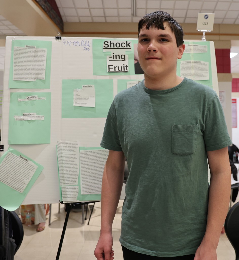 THS student at Miami County Science Day with his STEM project.