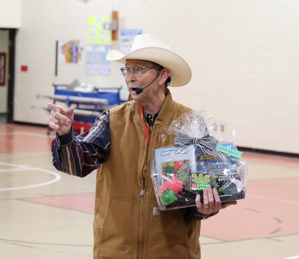 Mr. G as an auctioneer at L.T. Ball. 