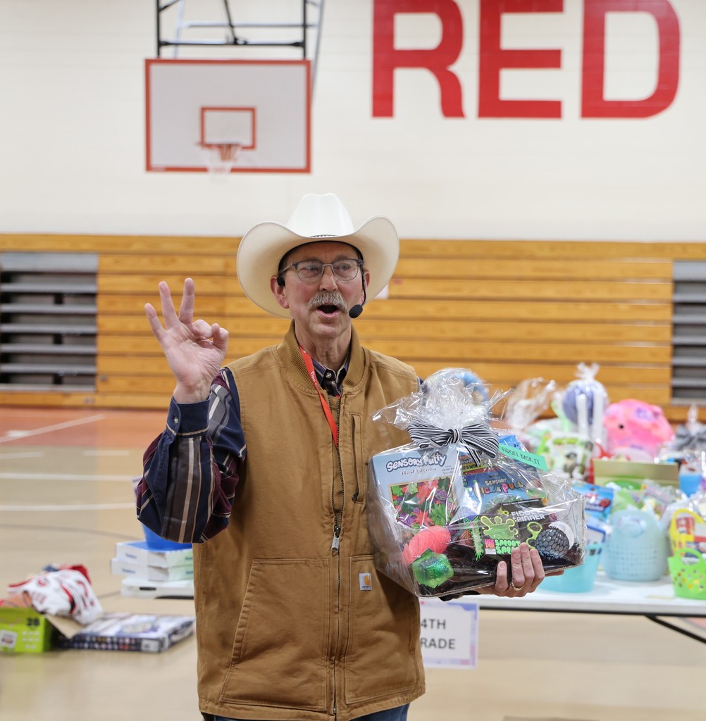 Mr. G as an auctioneer at L.T. Ball. 