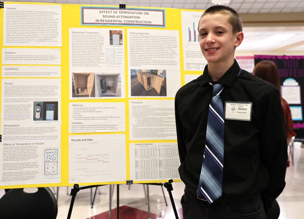 TMS student with his project at Miami County Science Day.