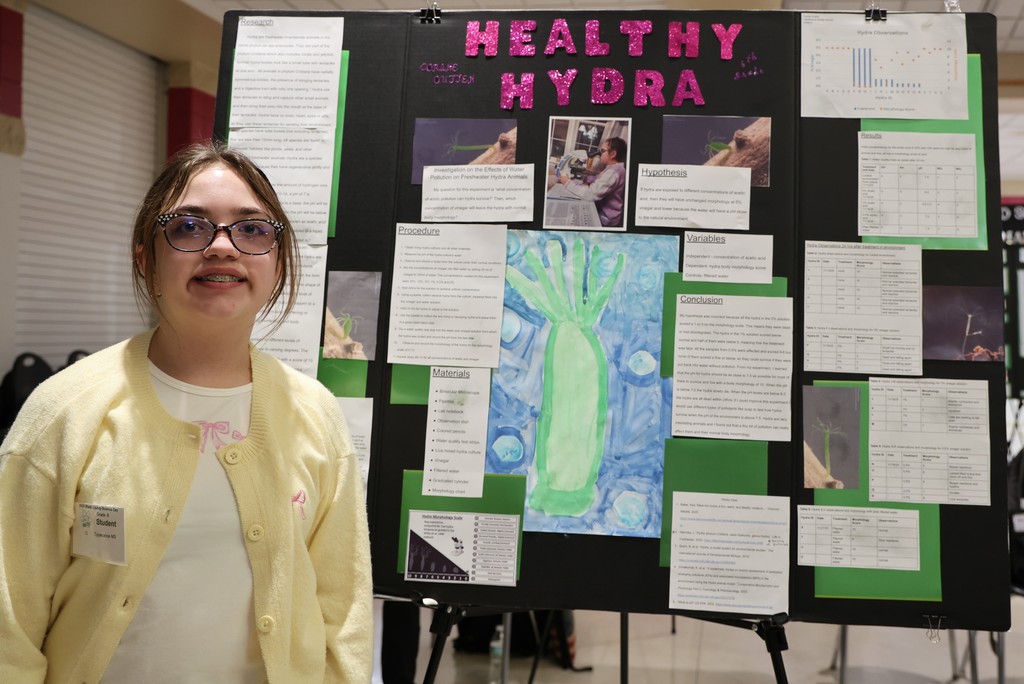 TMS student with her STEM research at the recent Miami County Science Day.