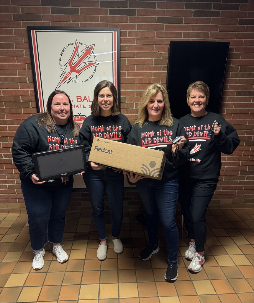 Fourth grade math teachers with their new Redcat audio system.