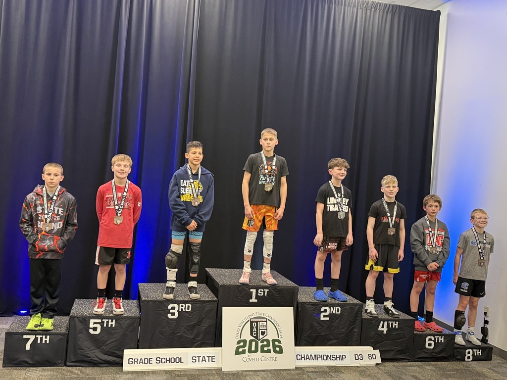 A student on the podium for his fourth palce finish at OAC State competition.
