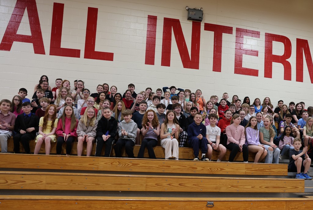 The photo taken by one of our fifth grade students  show classmates cheering him on as he snaps the picture.