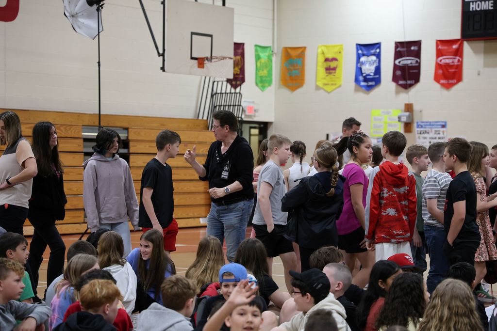 Students get directions on where to sit.  