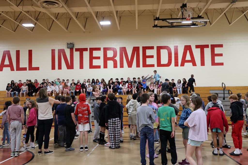 Students fill the bleachers.  