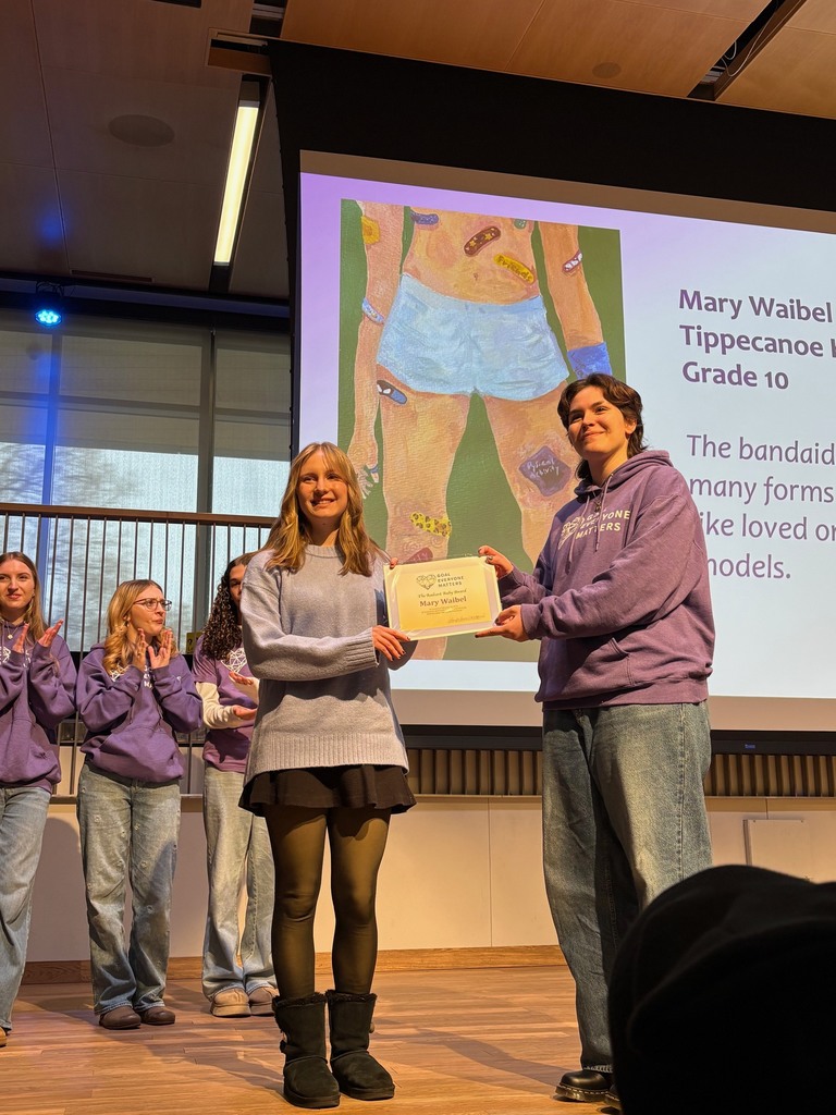 Mary Waibel of THS accepts her art award.  