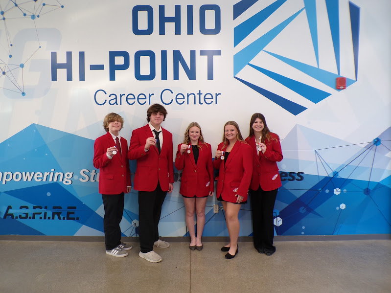 THS students who successfully competed at the FCCLA  competition hold up their medals.  