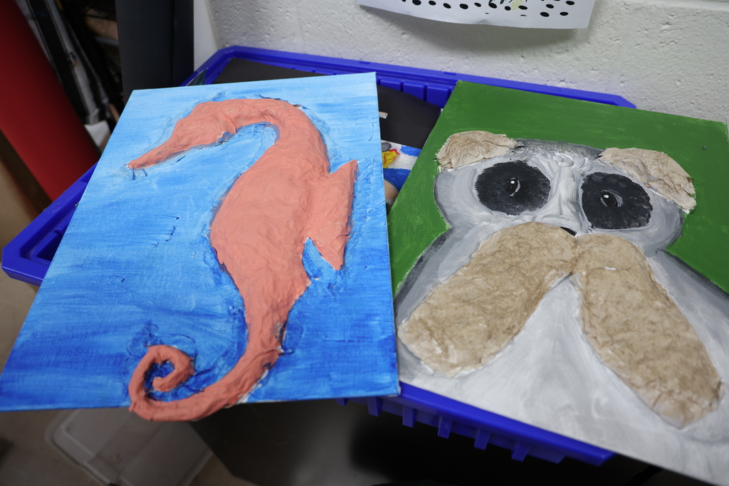A students art project that is a 3D seahorse out of paper mache and painted