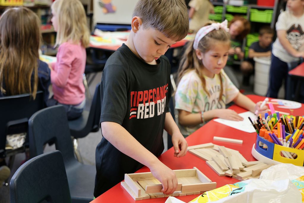 A Broadway student builds with blocks.  