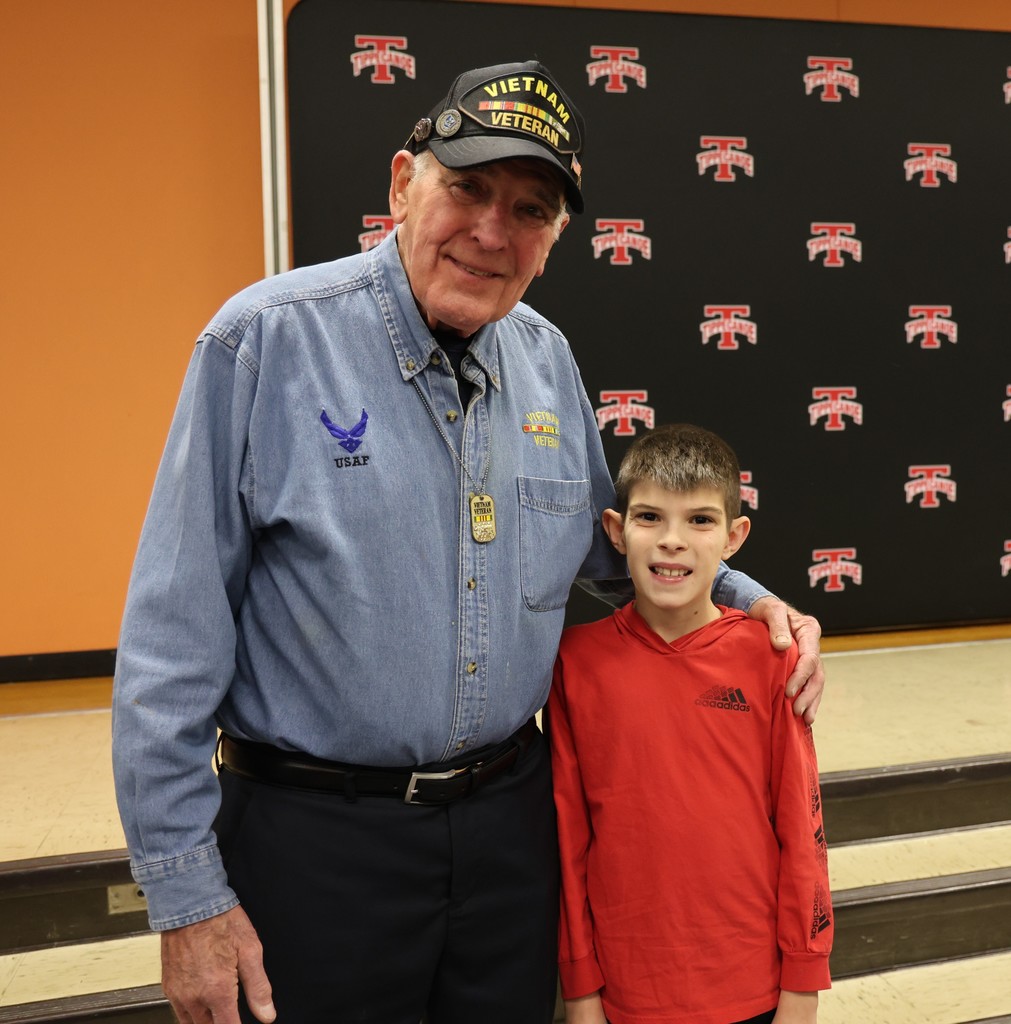 An L.T. Ball student meets the person he wrote to during a Veterans Day project.  