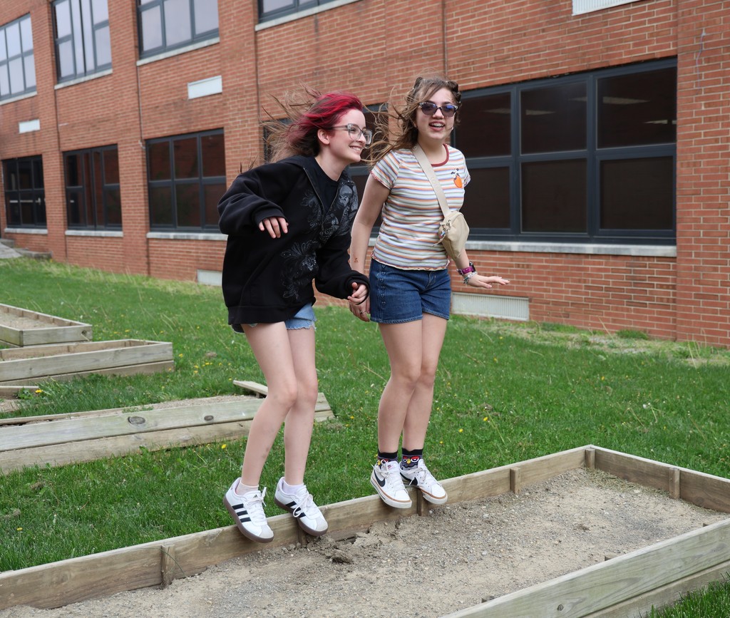 Two students having fun during the after school garden club.  