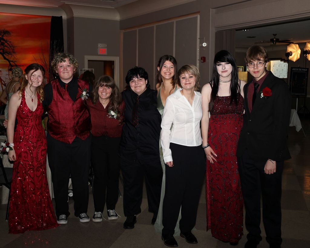 THS students take time at prom to pose for a photo.  