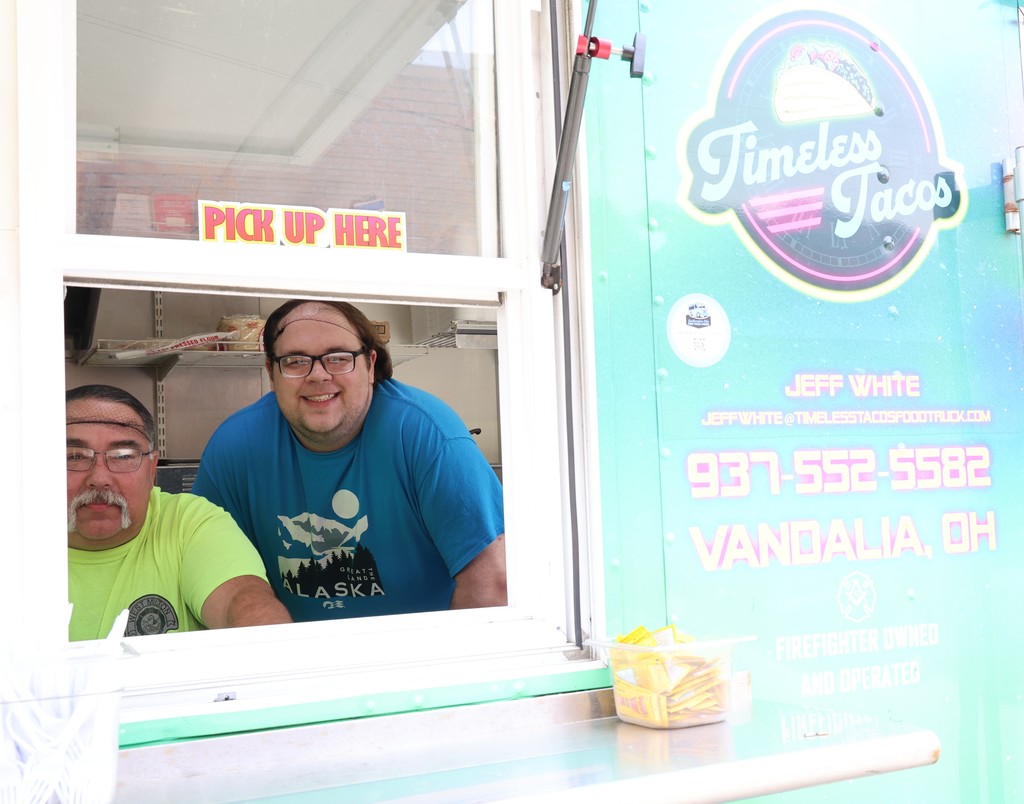 Taco truck employees ready to serve.