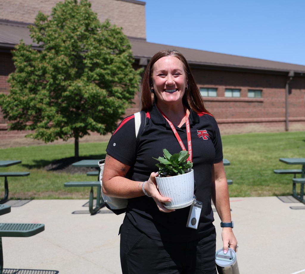 THS staff member with her potted plant.