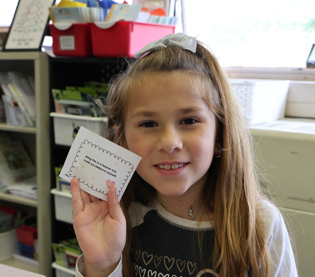 A Broadway students holds her little note for a teacher that made her believe in herself.  