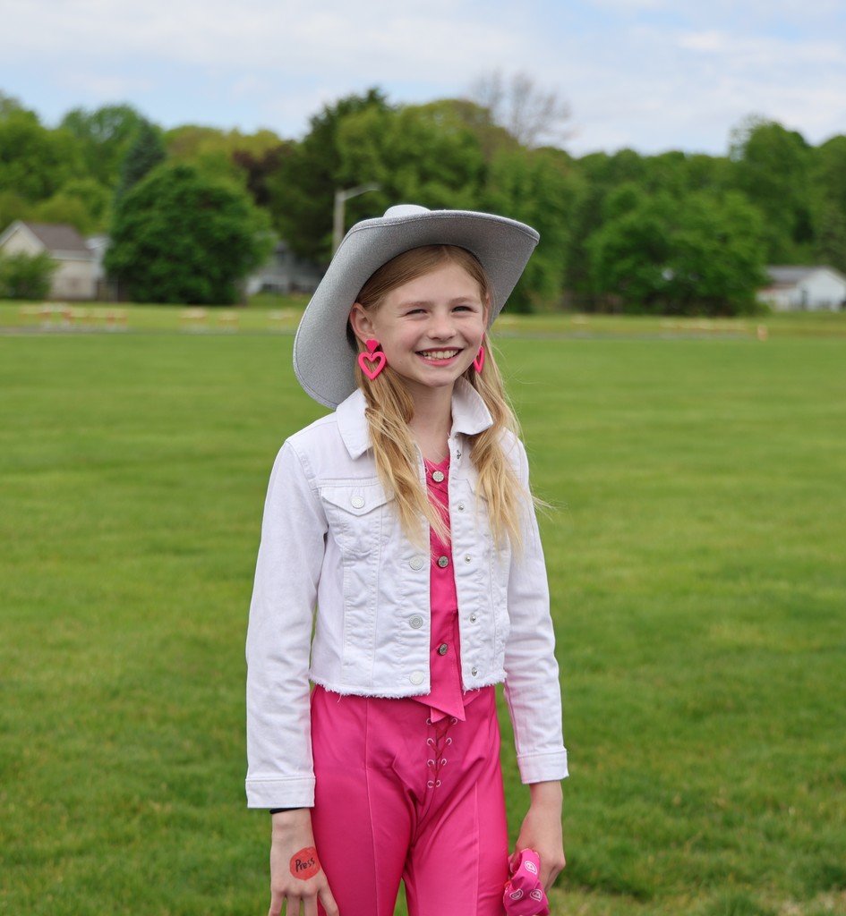 A student dressed as a country singer for the wax museum.  