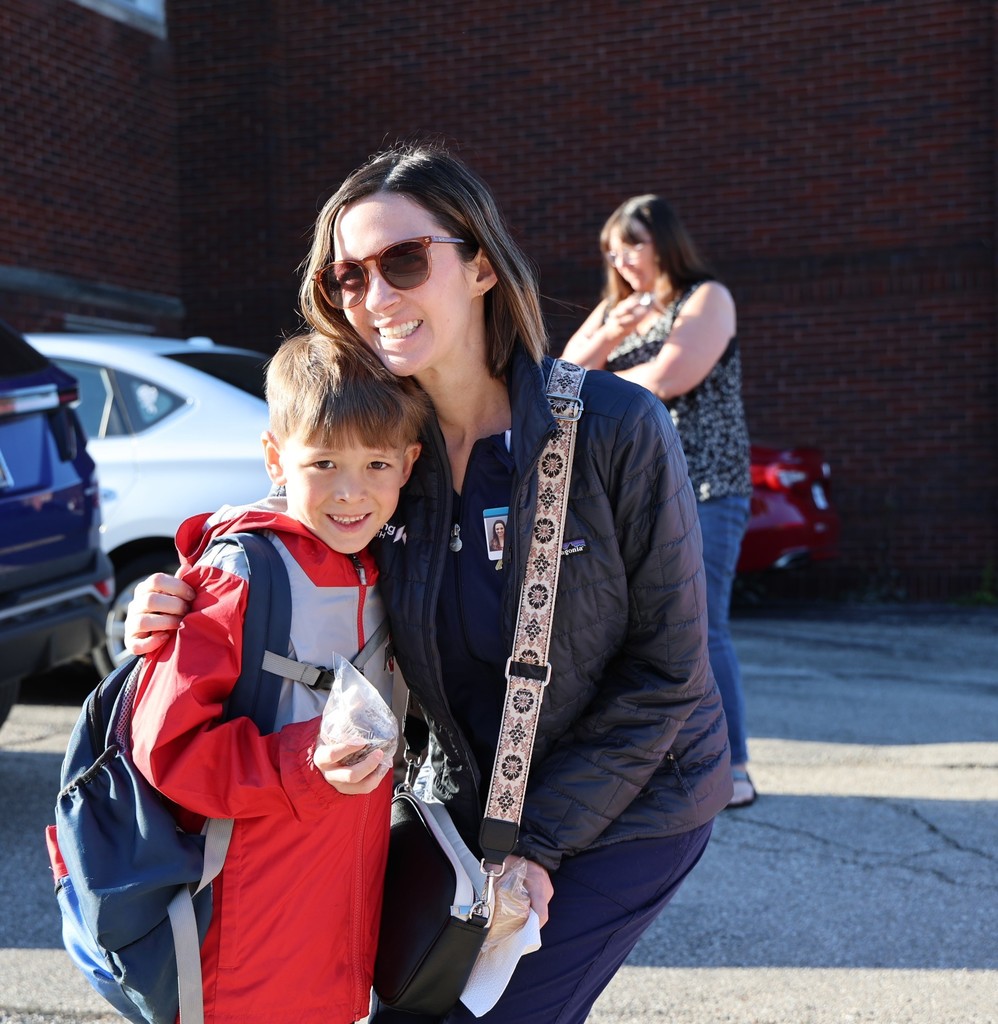 A mom and her son during Muffins in the Morning at Broadway.