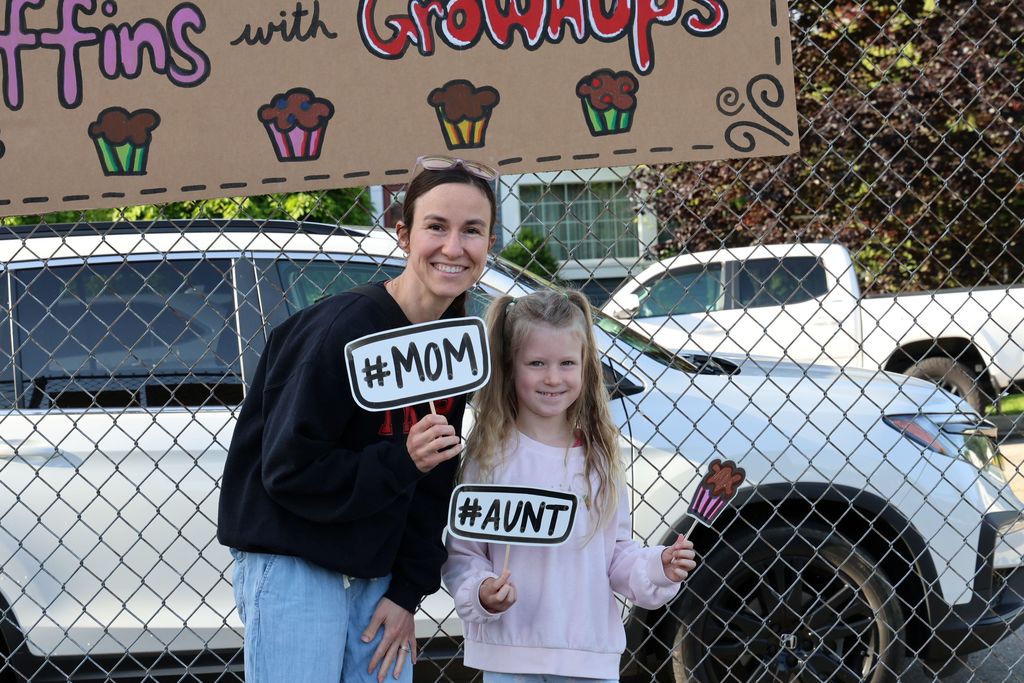 A family at Broadway Elementary's Muffins in the Morning. 