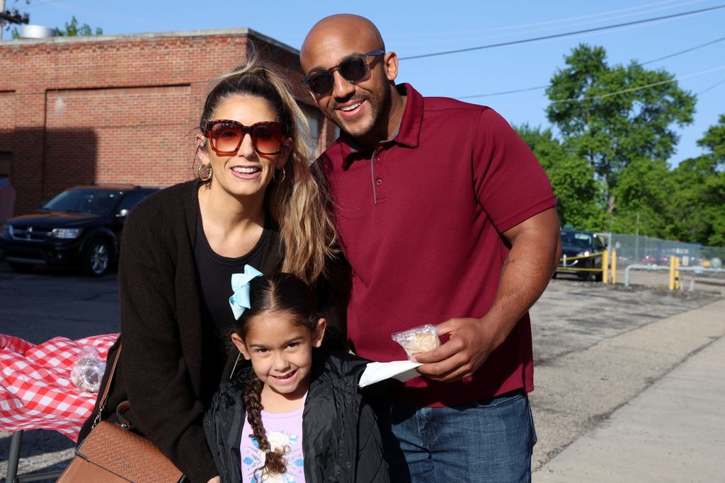 A family at Broadway Elementary's Muffins in the Morning. 