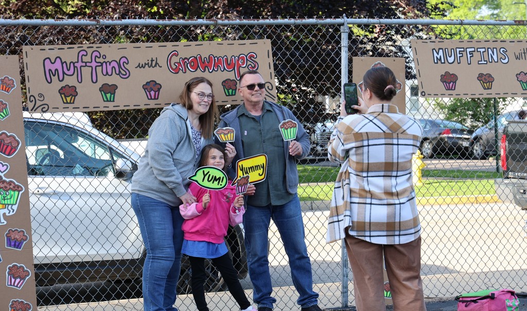 A family at Broadway Elementary's Muffins in the Morning. 