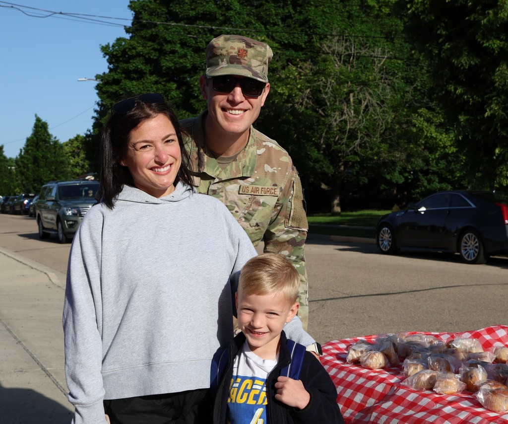 A family at Broadway Elementary's Muffins in the Morning. 
