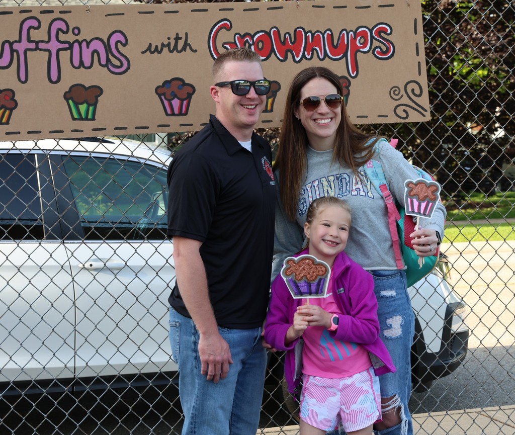 A family at Broadway Elementary's Muffins in the Morning. 