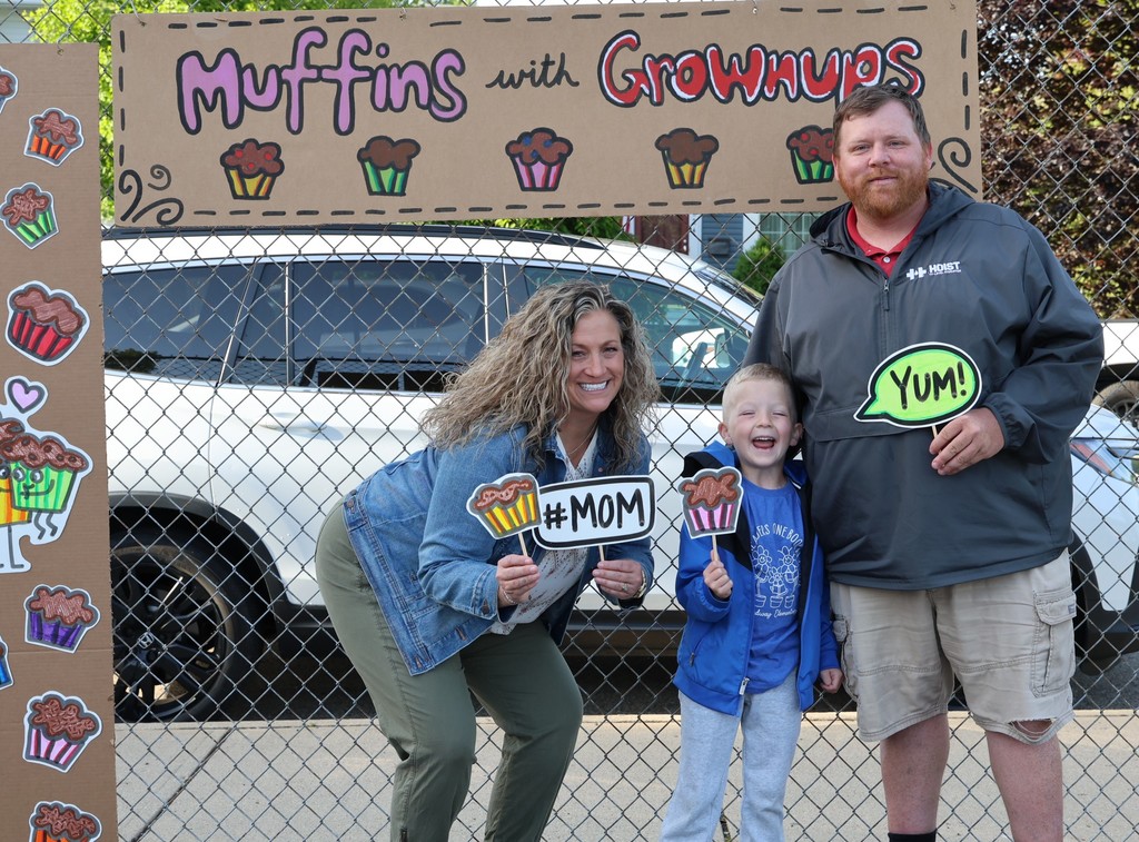 A family at Broadway Elementary's Muffins in the Morning. 