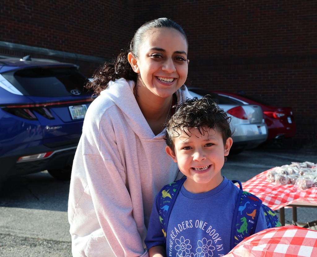A family at Broadway Elementary's Muffins in the Morning. 
