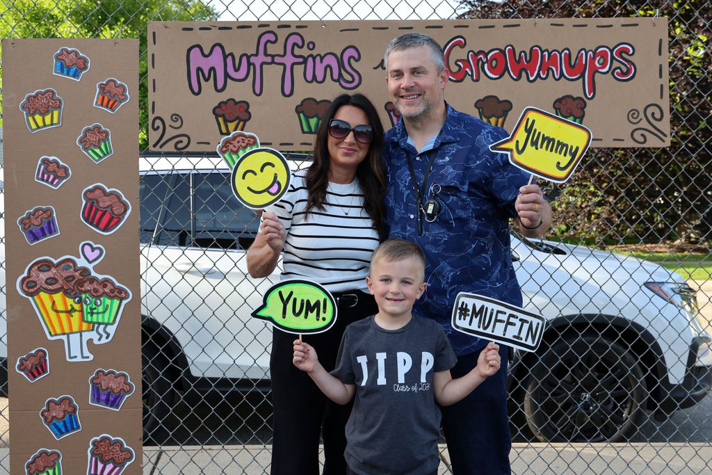 A family at Broadway Elementary's Muffins in the Morning. 