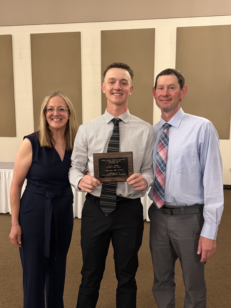 THS student with his parents with his Miami County Excellence in Education Award.