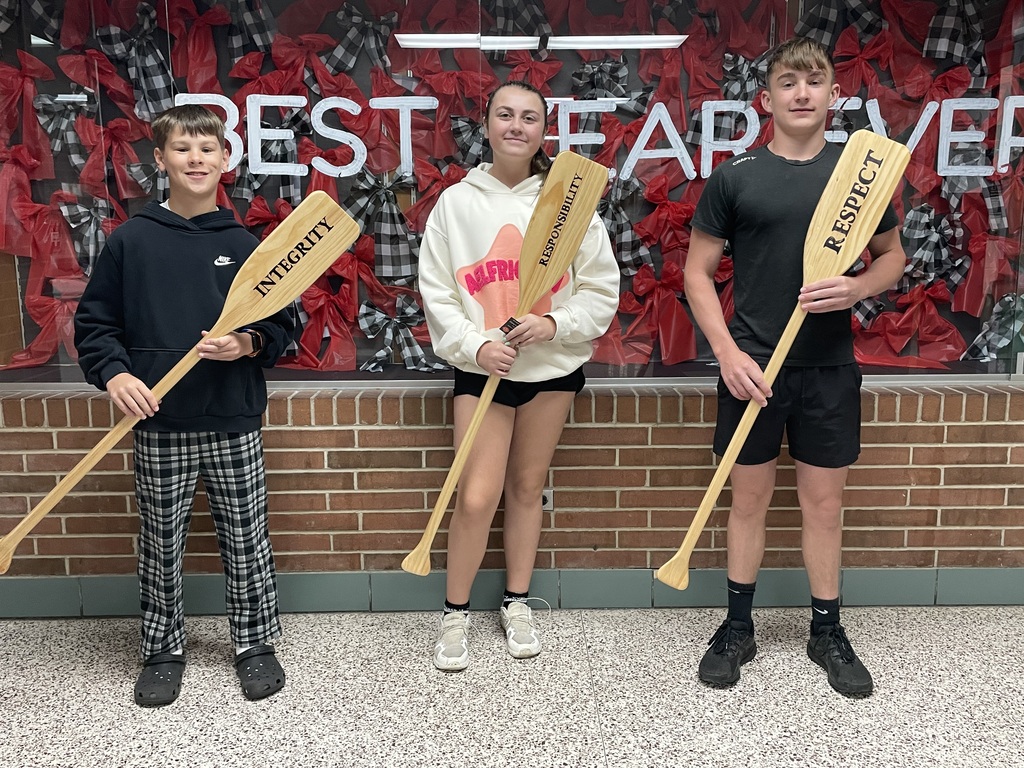 TMS Crew of the Week with the oars to represent the three PBIS pillars.  
